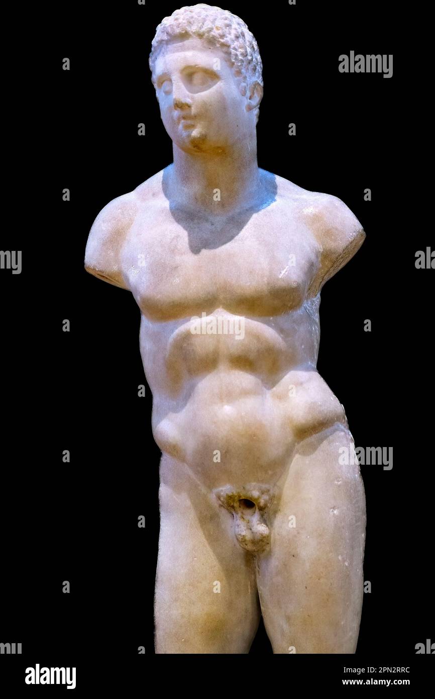 Toronto, Canada - April 7, 2023: Roman marble sculpture of a young man based on Egyptian culture (AD 100-200), The object is part of an exhibit in the Stock Photo