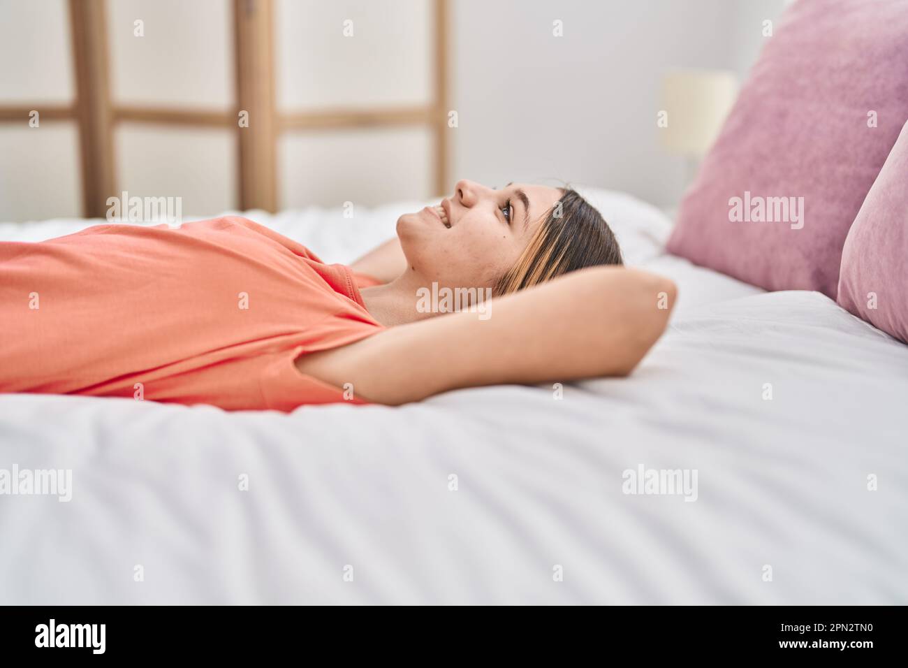 Teenager girl lying bed looking hi-res stock photography and images - Alamy