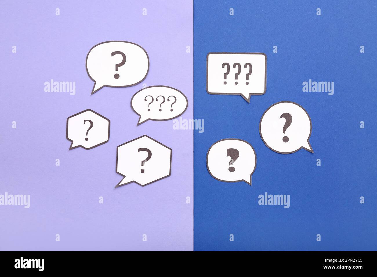 Speech bubbles with question marks on color background Stock Photo - Alamy
