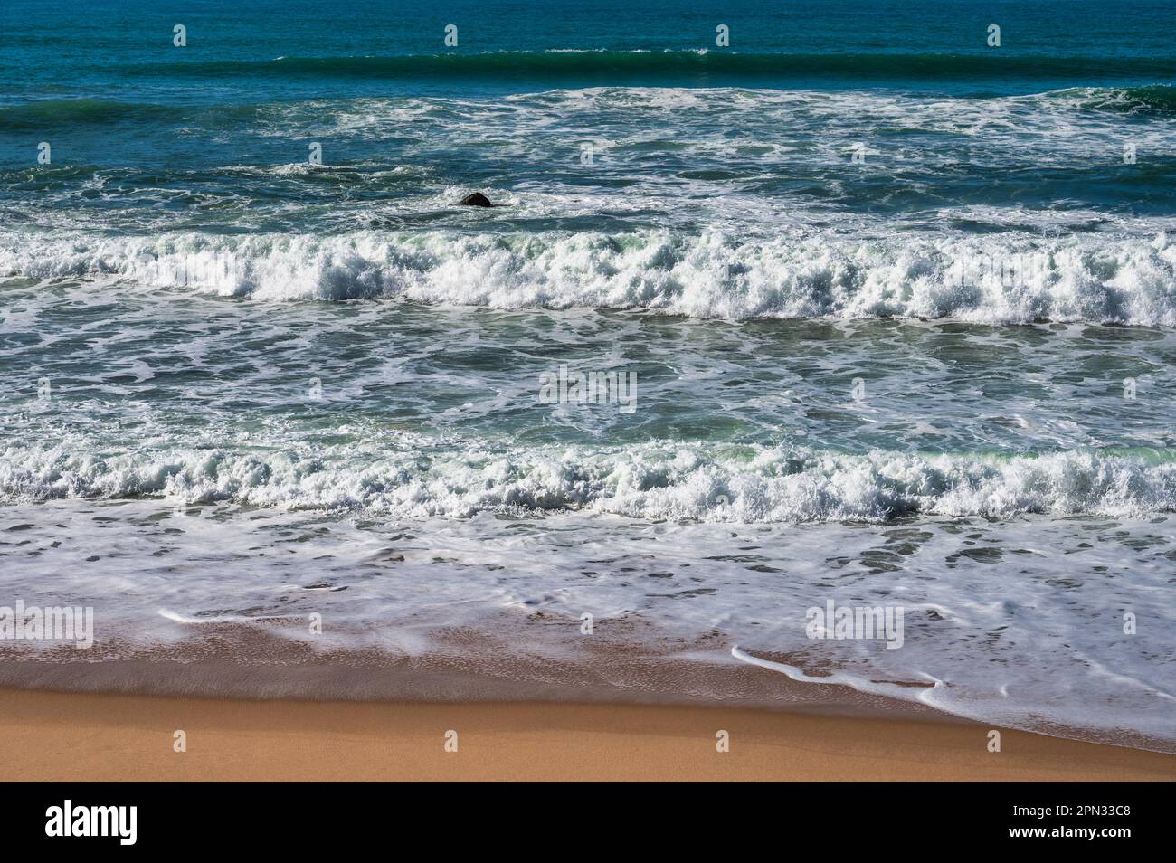 Ocean waves breaking in a beach Stock Photo - Alamy