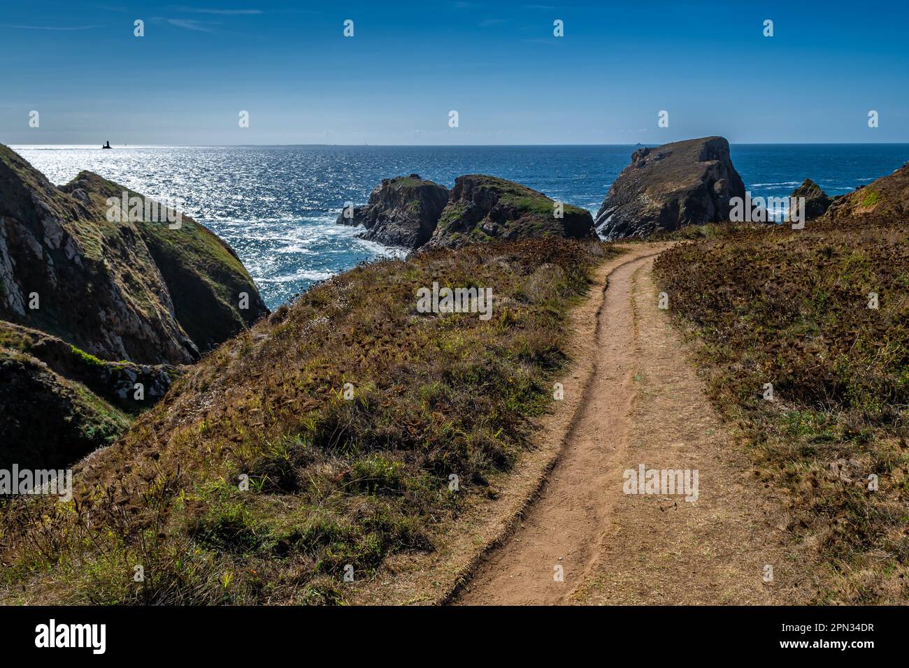 Coastal Hiking Path With Spectacular Cliffs At Peninsula Pointe Du Van On Cap Sizun At The Finistere Atlantic Coast In Brittany, France Stock Photo