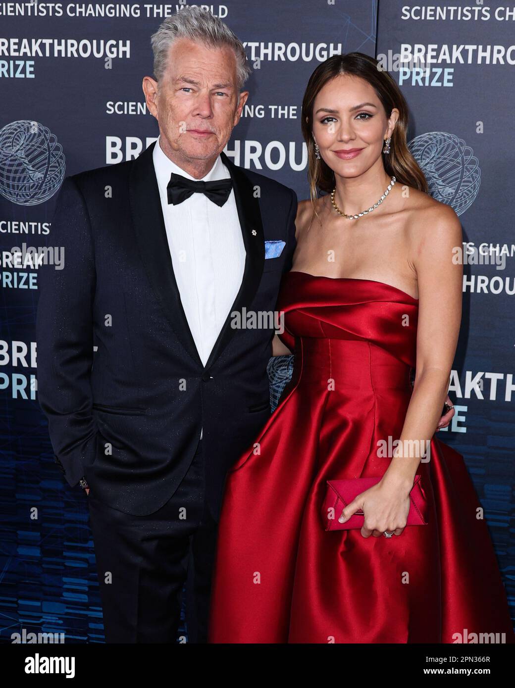 LOS ANGELES, CALIFORNIA, USA - APRIL 15: David Foster and wife