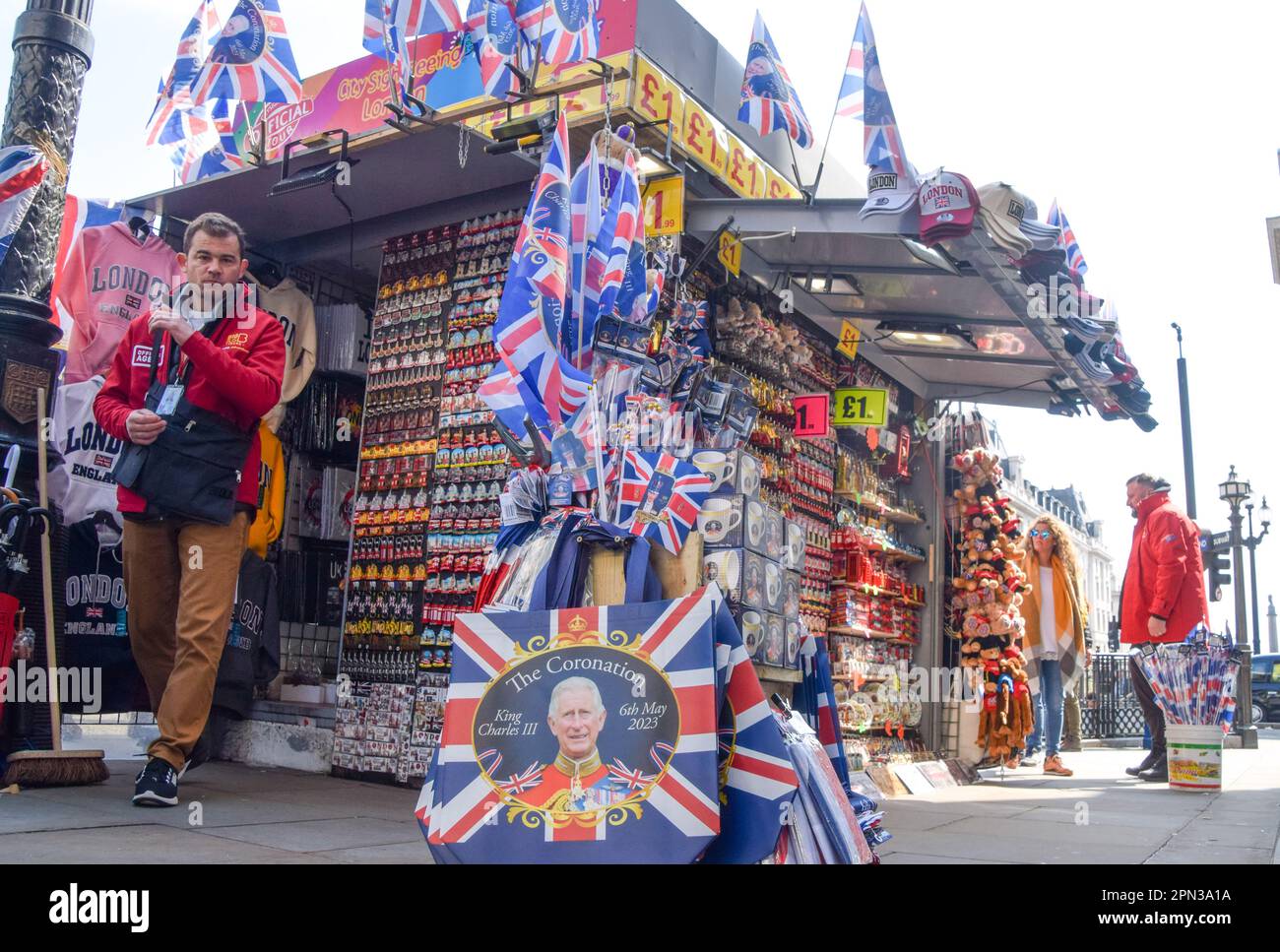 London, UK. 15th April 2023. Coronation souvenirs on sale in Central London as preparations for the coronation of King Charles III, which takes place on May 6th, continue around London. Stock Photo