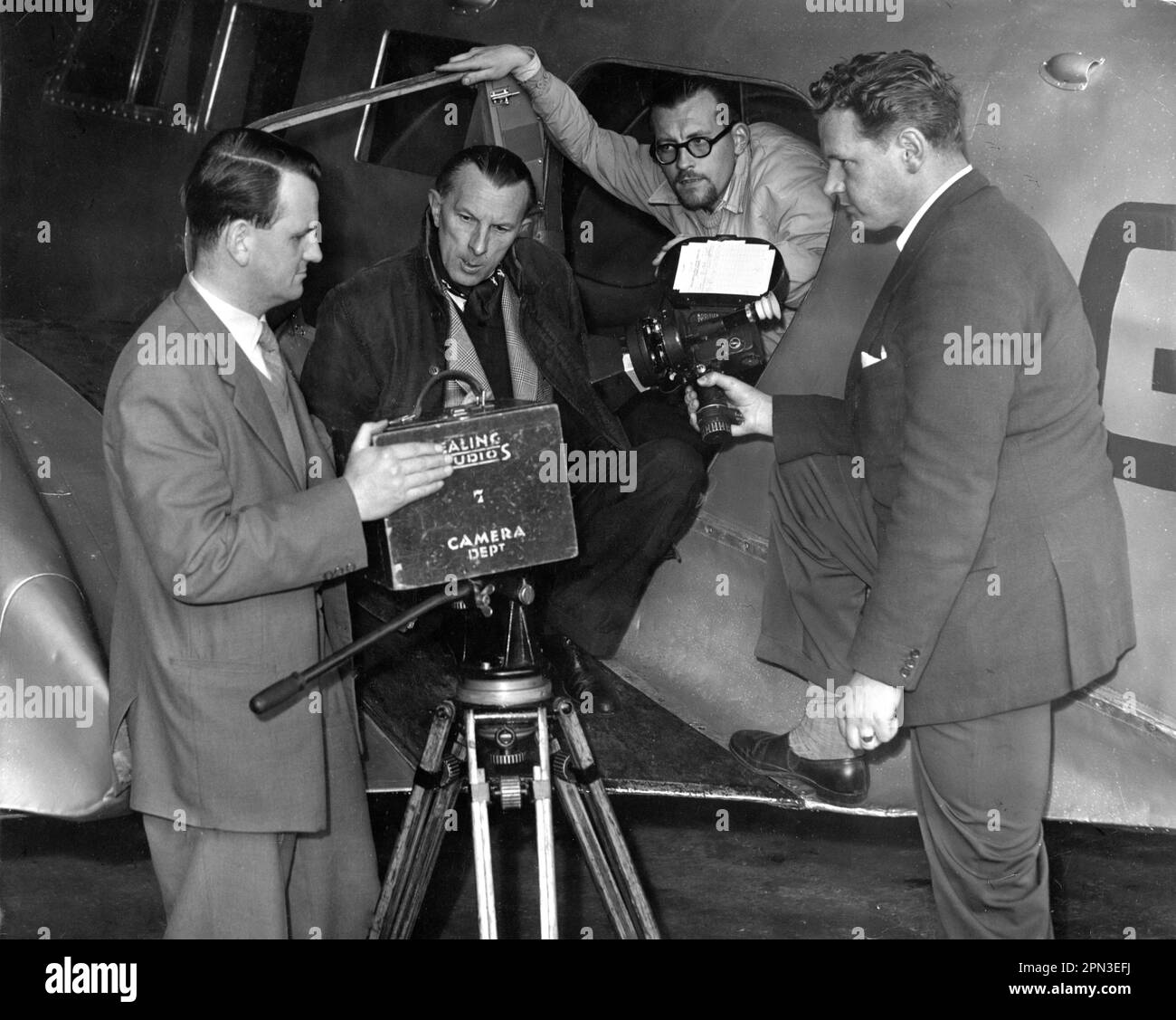 Second Unit Director of Photography GORDON DINES (2nd from left) and