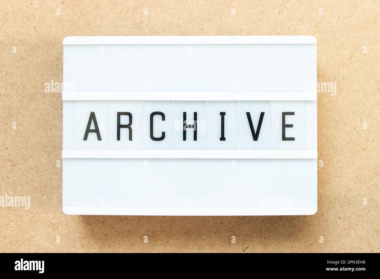 Lightbox with word archive on wood background Stock Photo