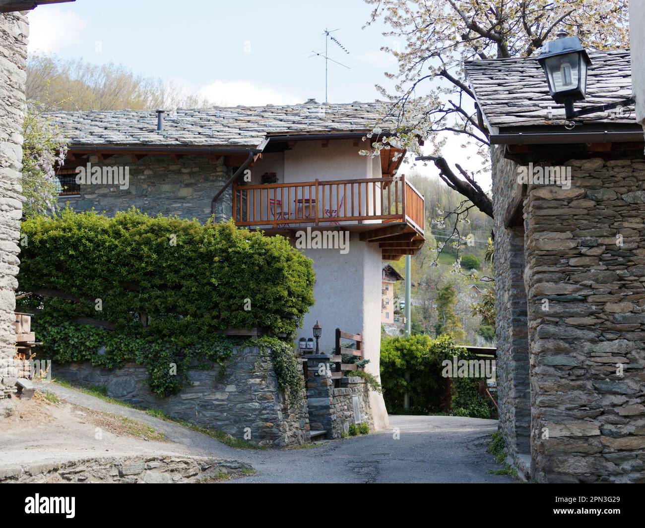 Traditional stone built houses with balcony near Nus in the Aosta Valley, Italy Stock Photo