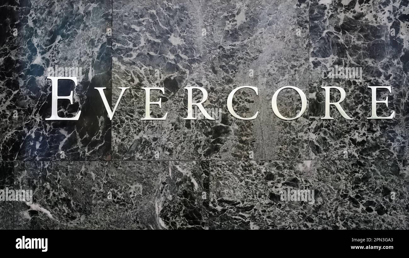 New York, NY - April 15, 2023 : Evercore corporate logo close up on marble at Midtown, Manhattan's Park Ave headquarters office. Stock Photo