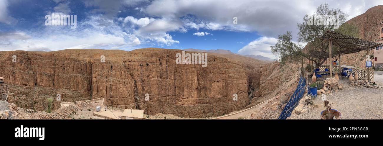 Morocco, Africa: the river and the stunning road climbing from Boumalne Dades to the Dades Gorge, a gorge carved by the Dades River Stock Photo