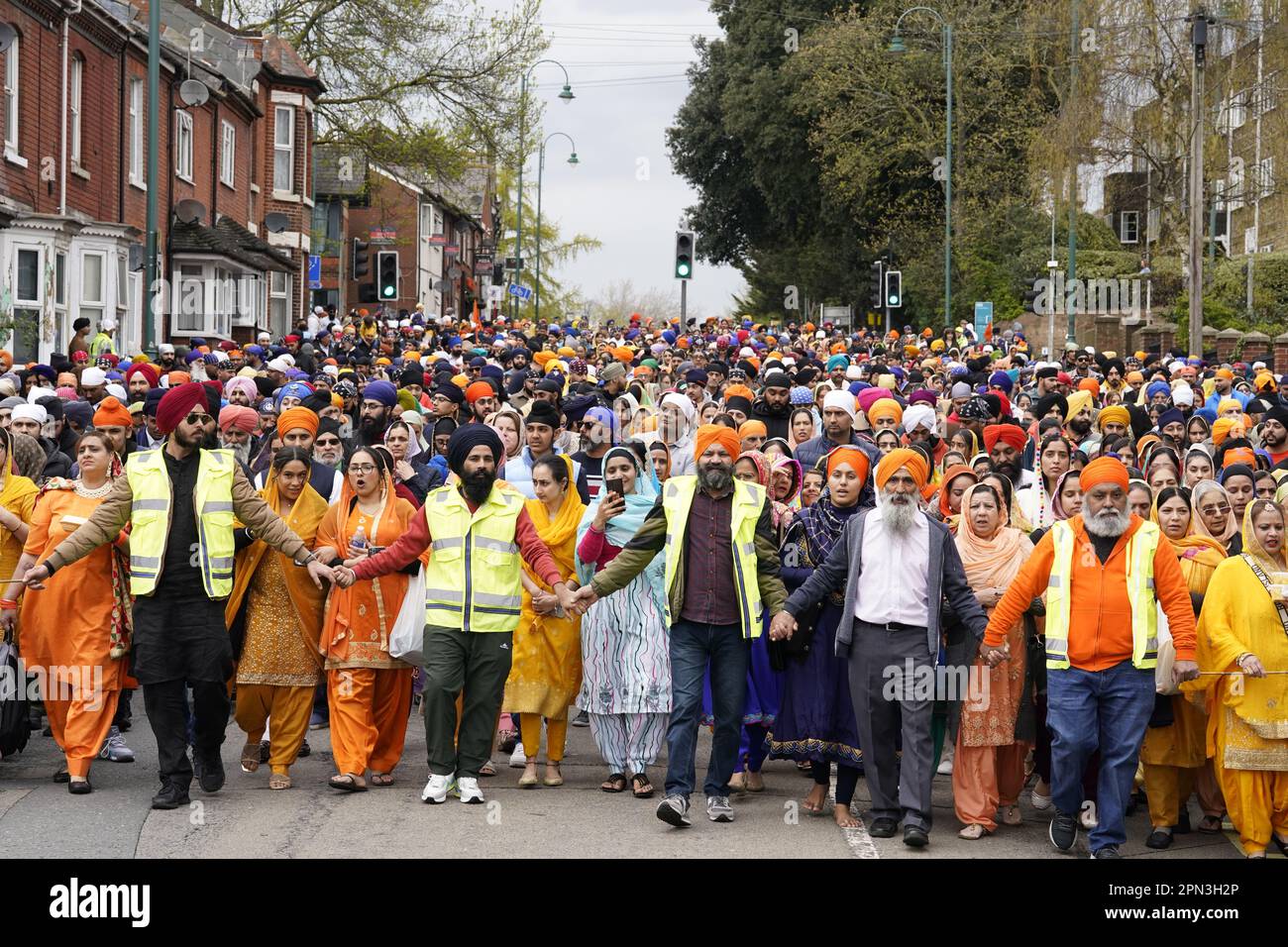 People take part in the Nagar Kirtan procession through the city centre