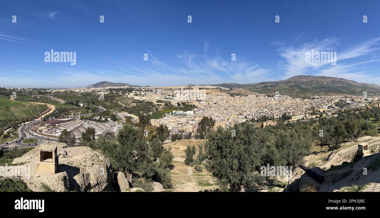 Fes, Morocco: skyline of the city with the old medina and the Ville Nouvelle surrounded by the hills seen from Borj Sud (Burj al-Janub) fortification Stock Photo