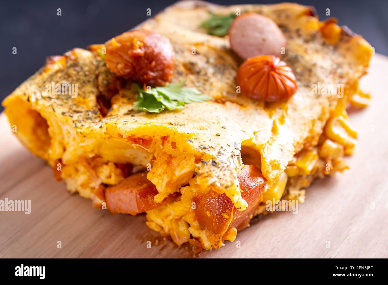 Cut piece of sausage pie in a blender, typical Brazilian dish