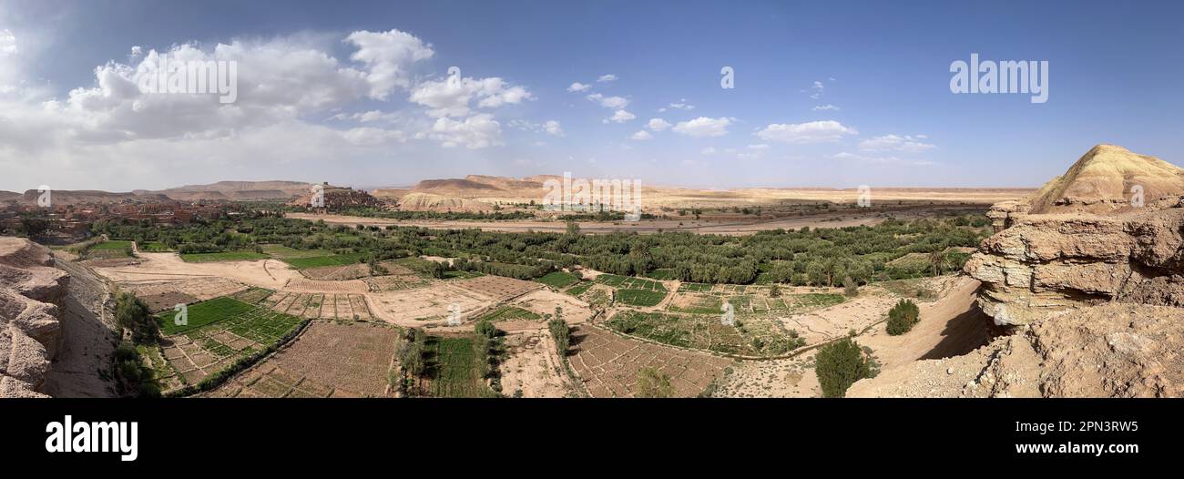 Morocco: the valley with Ait Benhaddou on the background, historic fortified village along the former caravan route between Sahara and Marrakech Stock Photo