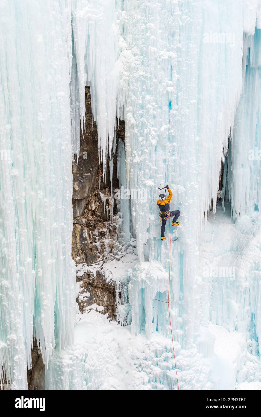 Doug Hollinger climbing a route in Johnston Canyon in Canada Stock Photo