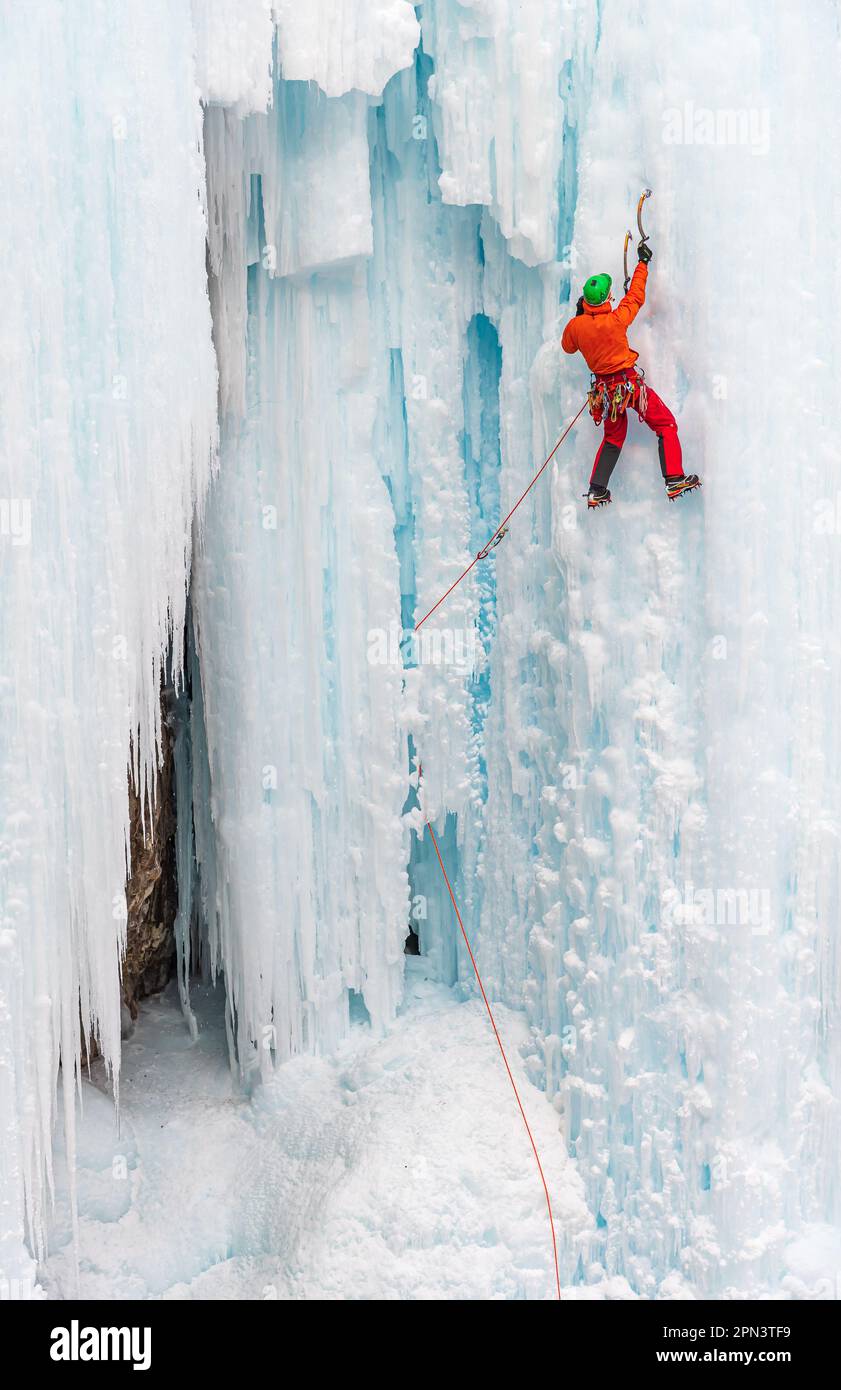 Marc Godbout climbing a route in Johnston Canyon in Canada Stock Photo