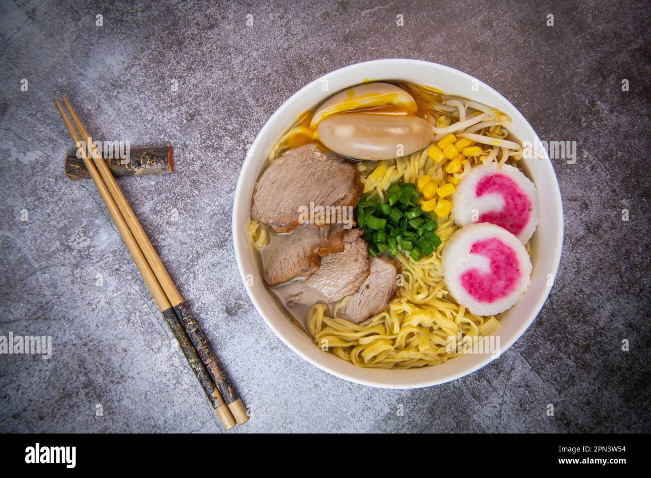 Fresh ramen noodles with garnish, pork tenderloin, eggs marinated in