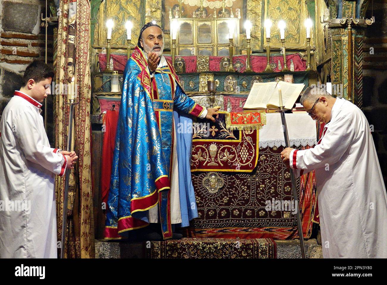 Priest Behnam Konutgan Leads The Mass At The Virgin Mary Church In priest-behnam-konutgan-leads-the-mass-at-the-virgin-mary-church-in
