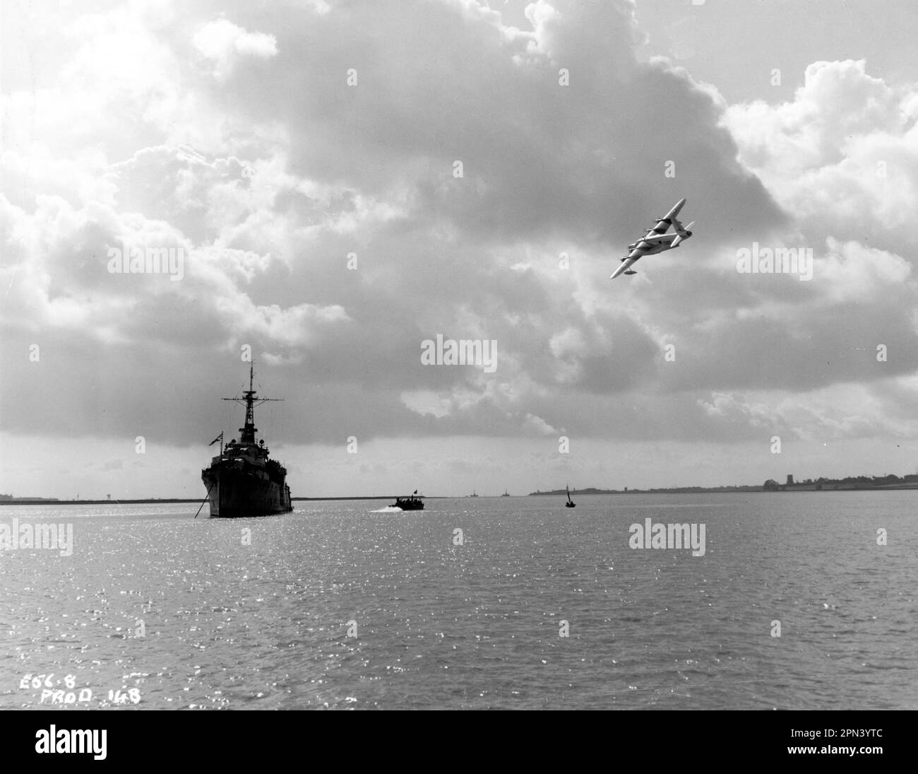 H.M.S AMETHYST and Seaplane on River Orwell, Ipswich, Suffolk during location filming of YANGTSE INCIDENT 1957 director MICHAEL ANDERSON screenplay Eric Ambler Wilcox-Neagle / Everest Pictures Ltd. / British Lion Film Corporation Stock Photo