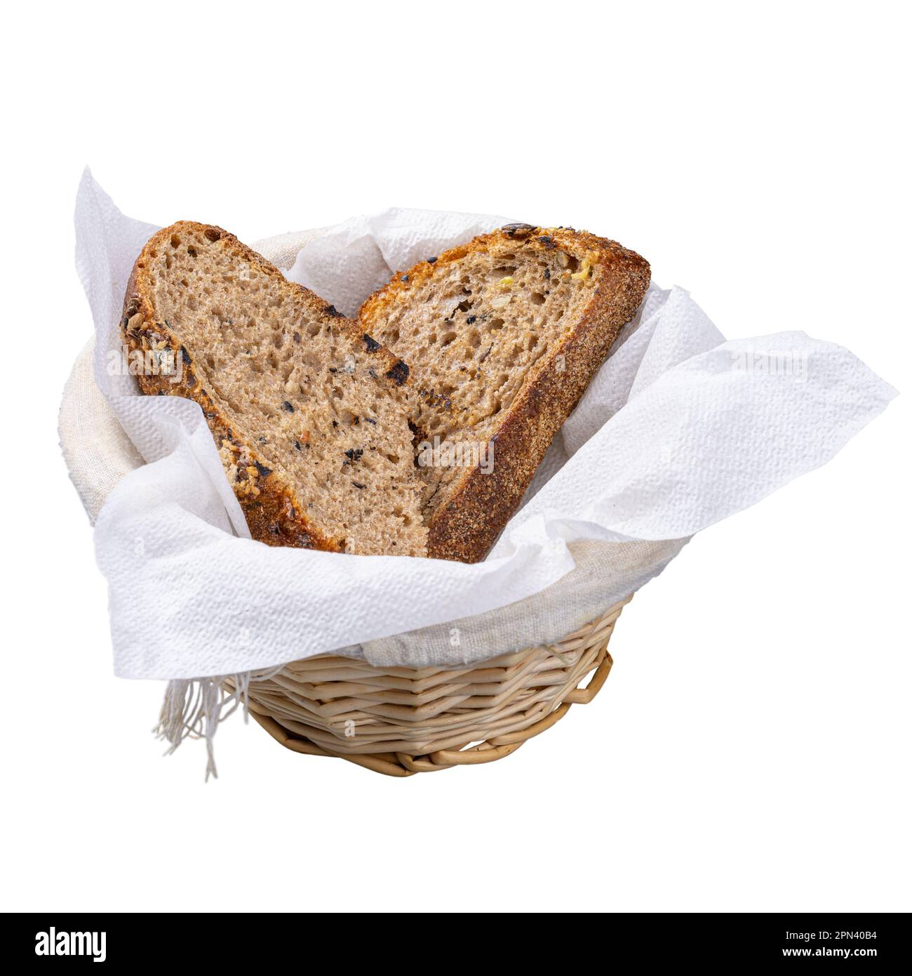 Two slice of seeded multigrain bread in basket Stock Photo