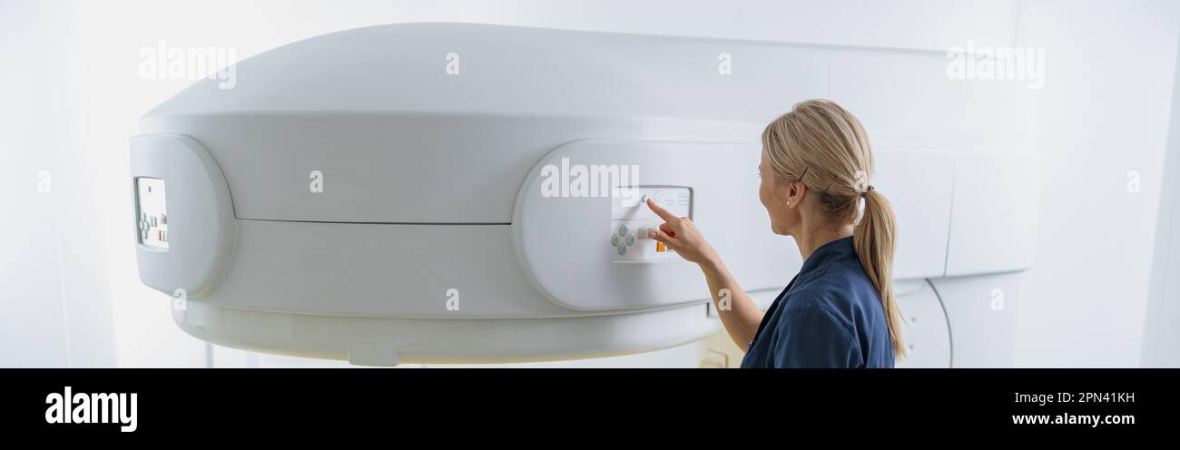 Radiologist controls MRI or CT or PET Scan with female patient ...