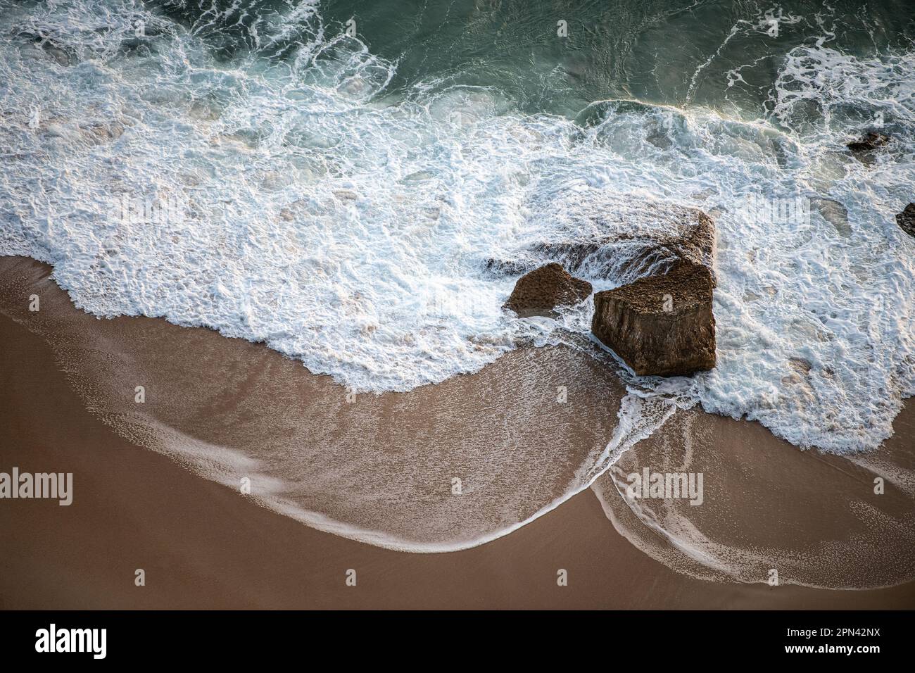 Aerial foamy sea waves rocky hi-res stock photography and images - Alamy