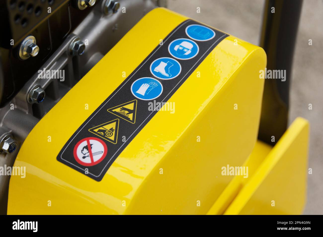 Close up of health and safety notices on construction machine Stock Photo