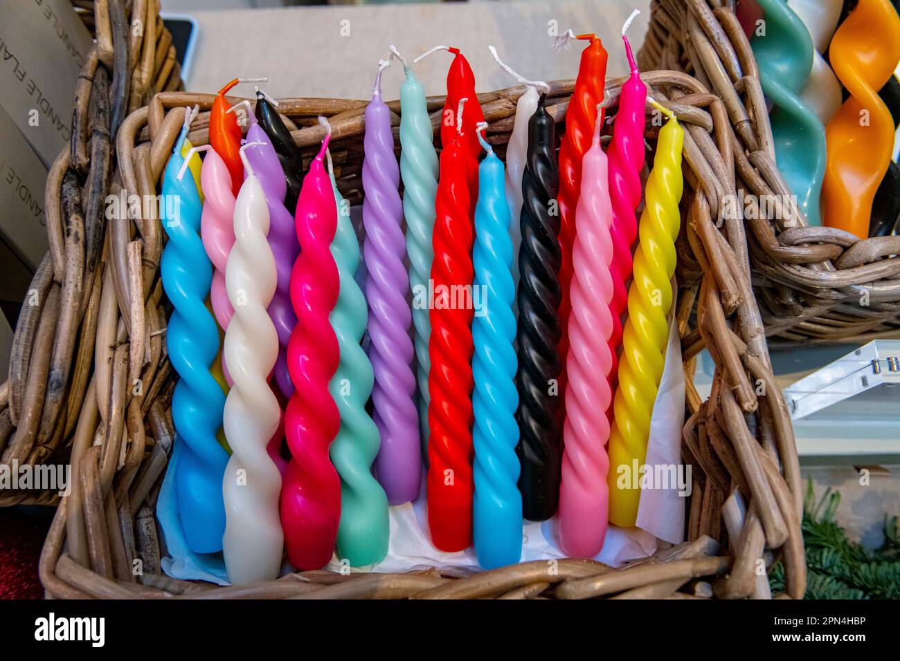 Twisted multicoloured candles Stock Photo