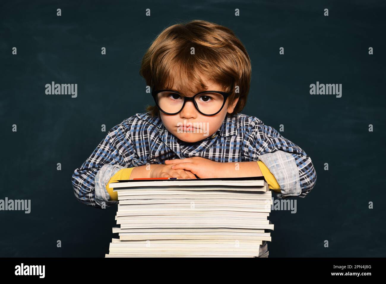 Elementary school. Education. Back to school. Schoolkid or preschooler getting bullied in school. School bullying. Science education concept. Stock Photo