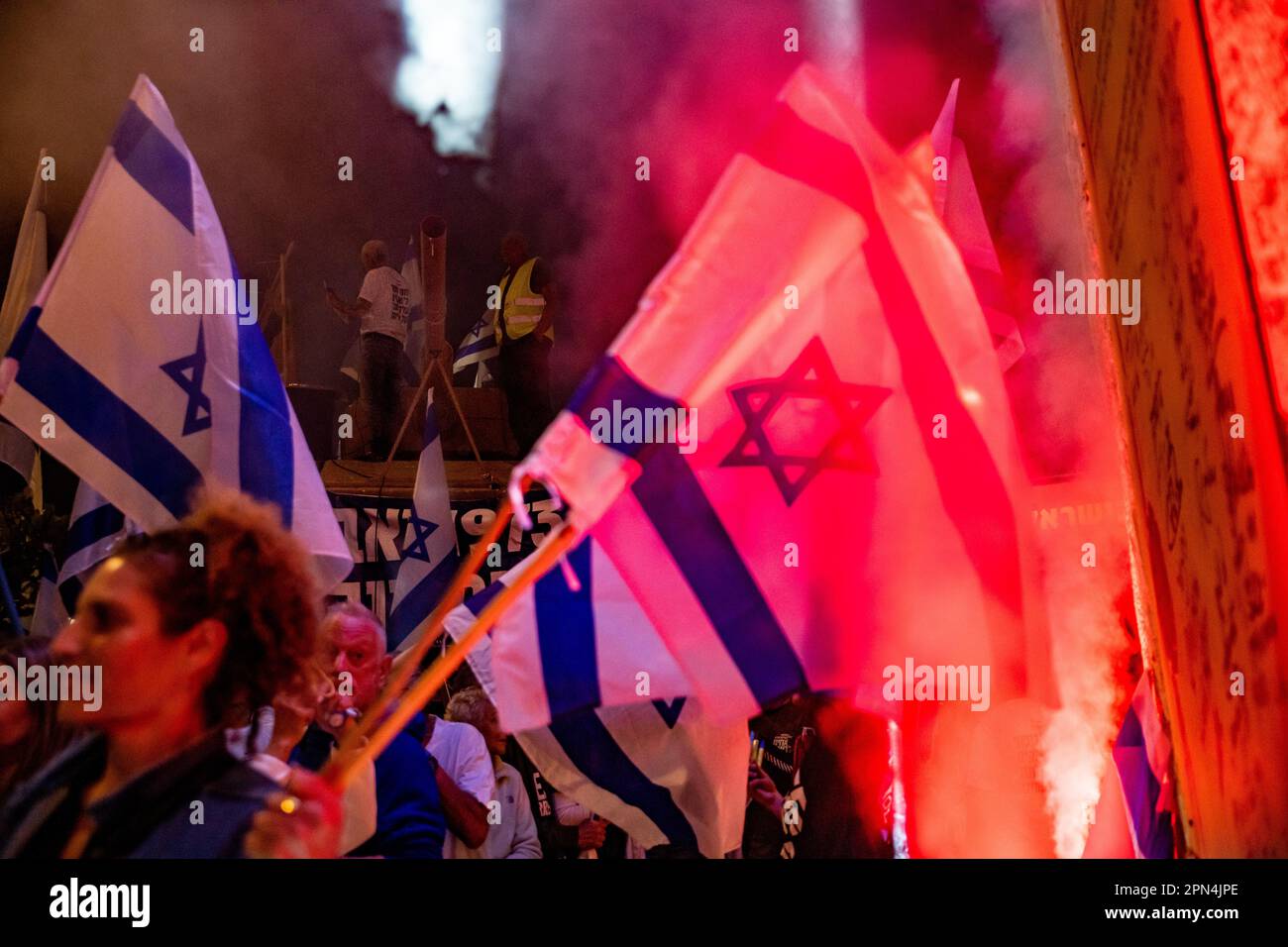Israel. 15th Apr, 2023. Protestors against the reform wave the Israeli flags next to a giant copy of the Israeli Declaration of Independence and a tank model brought by the warriors of the 73' Yom Kippur War in a protestation against the legal overhaul in Netanya. Apr 15th 2023. (Matan Golan/Sipa USA). Credit: Sipa USA/Alamy Live News Stock Photo