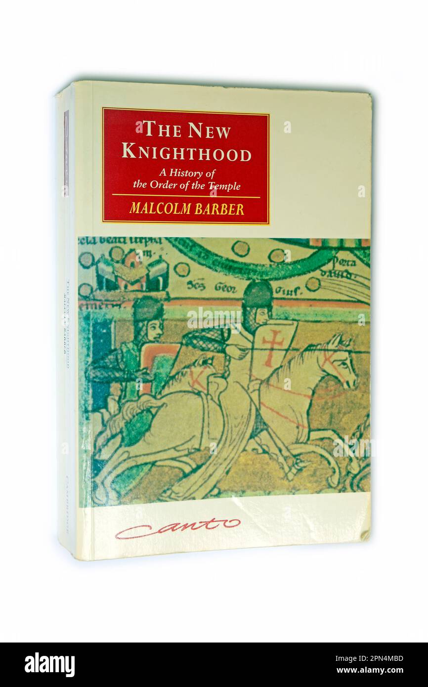 The New Knighthood - A History of The Order of the Temple by Malcolm Barber. Paperback book. Canto. Studio set up with white background Stock Photo