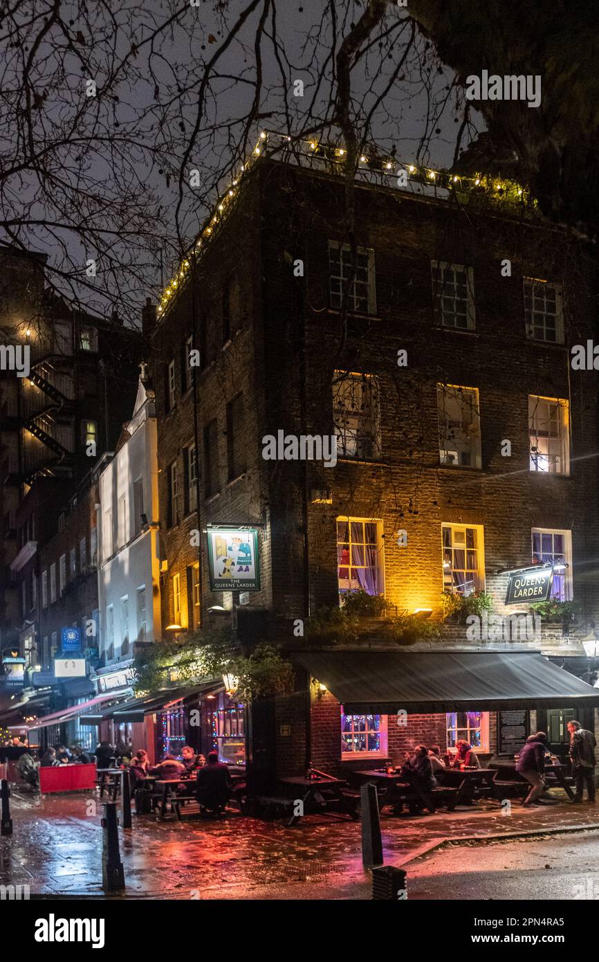 The Queen's Larder at night, Queen Square, Bloomsbury, London, UK Stock Photo