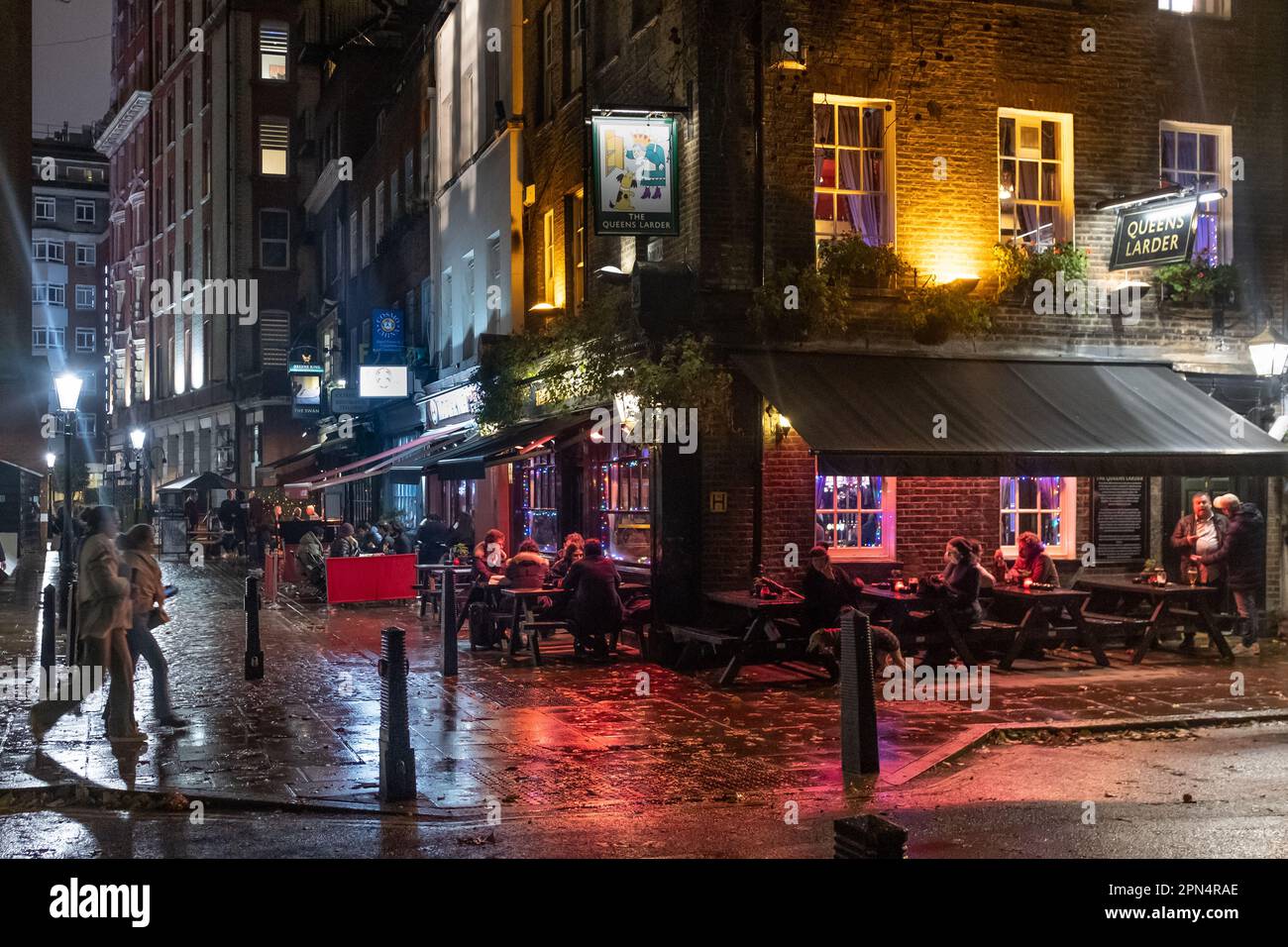 The Queen's Larder at night, Queen Square, Bloomsbury, London, UK Stock Photo