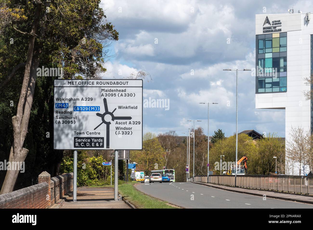 Street view along Church Road A3095 towards the Met Office Roundabout and Bracknell & Wokingham College building, Bracknell, Berkshire, England, UK Stock Photo