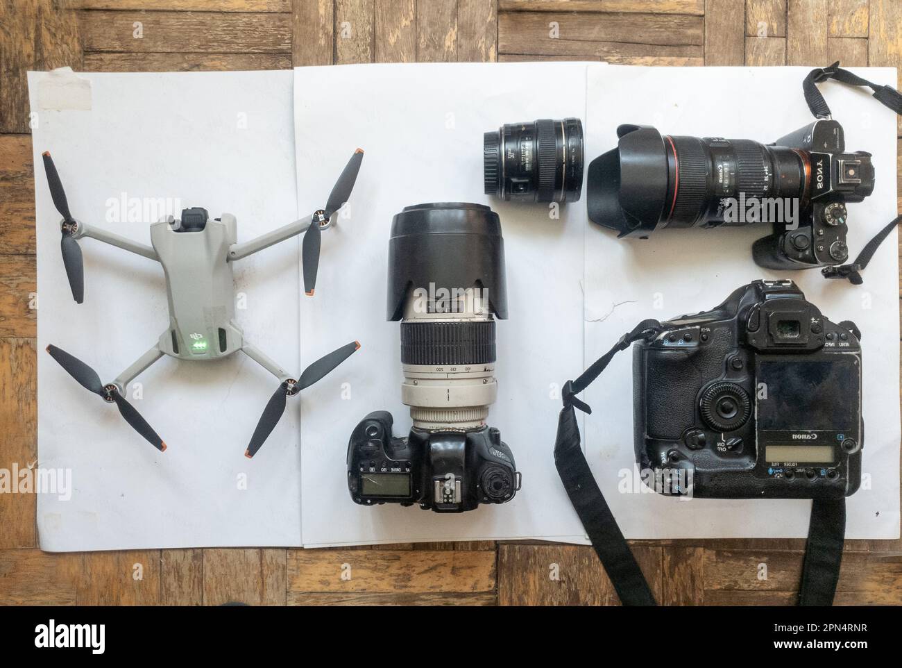 04-13-2023  Moscow Russia. Complect of several cameras and drones of  photographer: Canon , Sony and air drone od DJI ( buying on  Aliexpress,  now  f Stock Photo