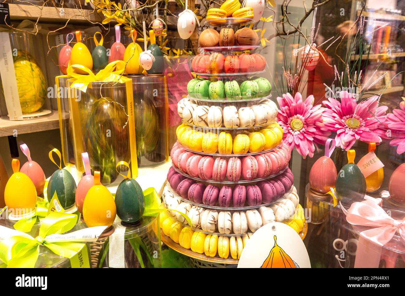 Tower of macaroons in confectionery shop window, Walstraat, Brugge (Bruges), West Flanders Province, Flemish Region, Belgium Stock Photo