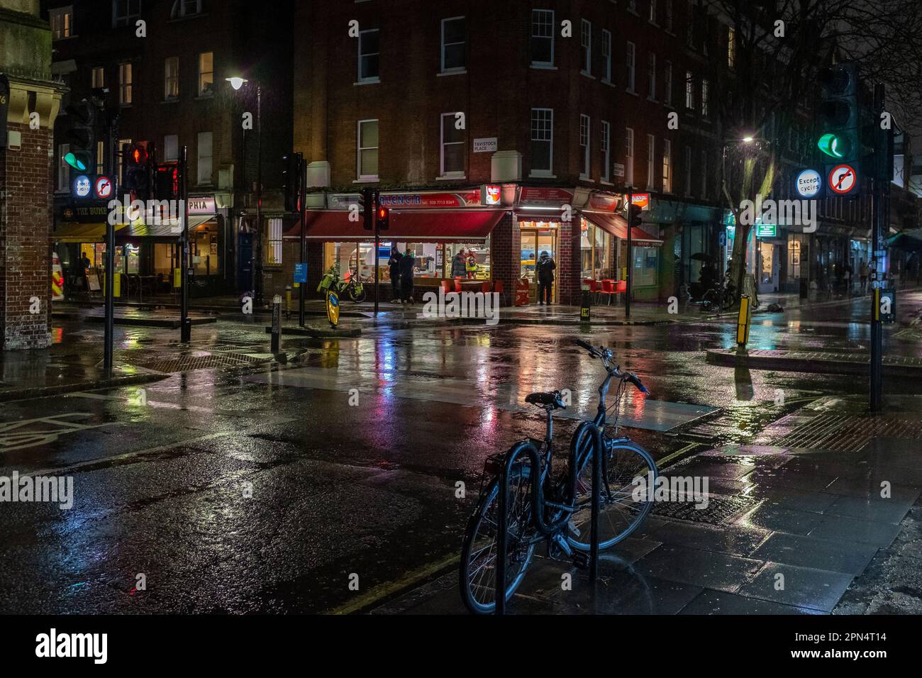 Marchmont Street at night in the rain, Bloomsbury, London, UK Stock Photo