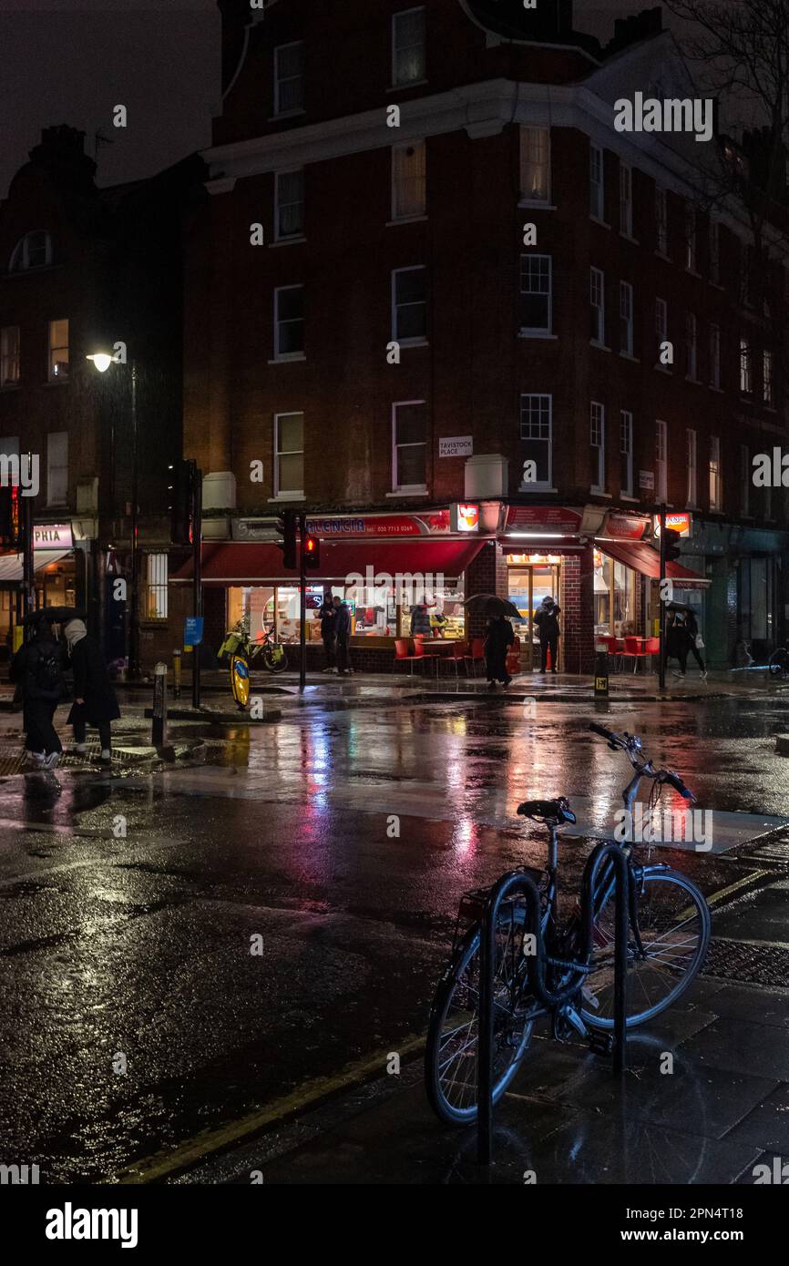Marchmont Street at night in the rain, Bloomsbury, London, UK Stock Photo