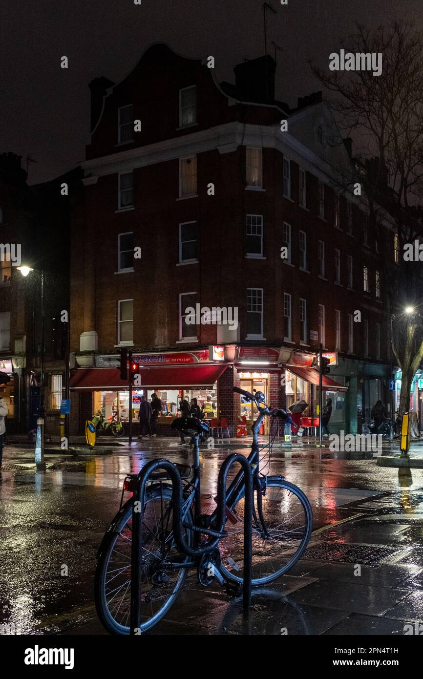 Marchmont Street at night in the rain, Bloomsbury, London, UK Stock Photo
