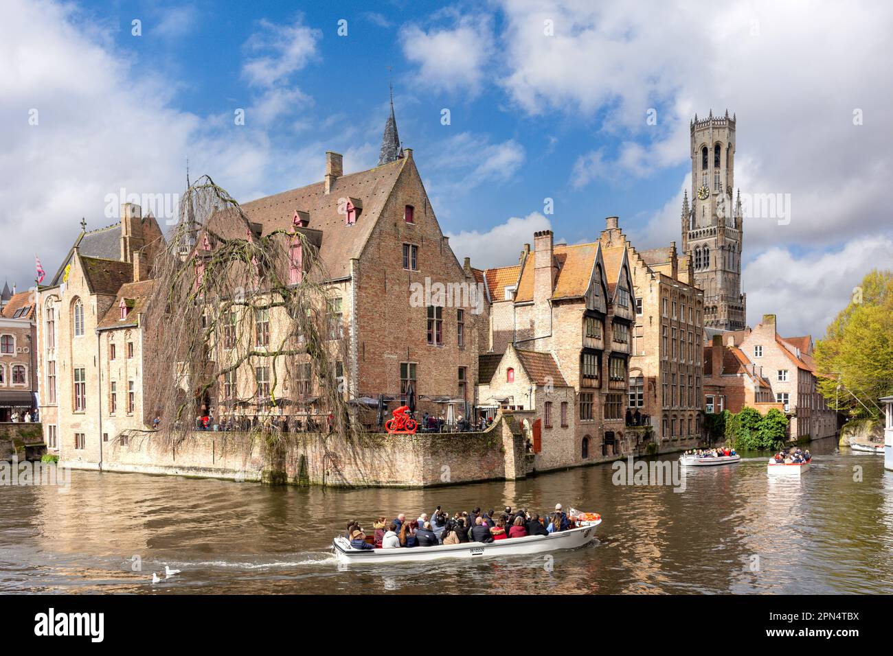 Sightseeing canal boats at The Rozenhoedkaai Canal, Bruges (Brugge), West Flanders Province, Kingdom of Belgium. Stock Photo