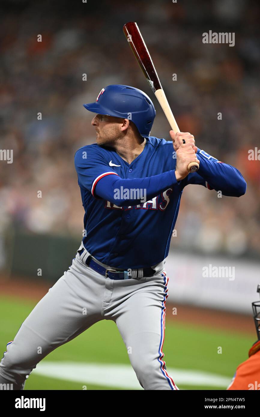 Texas Rangers left fielder Brad Miller (13) swings at a pitch