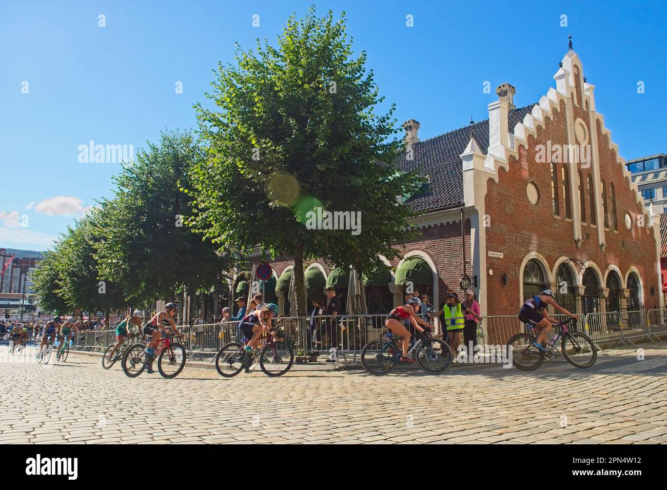 Womens field at the bike leg of the Bergen Norway World Triathlon Cup event August 2022 Stock Photo