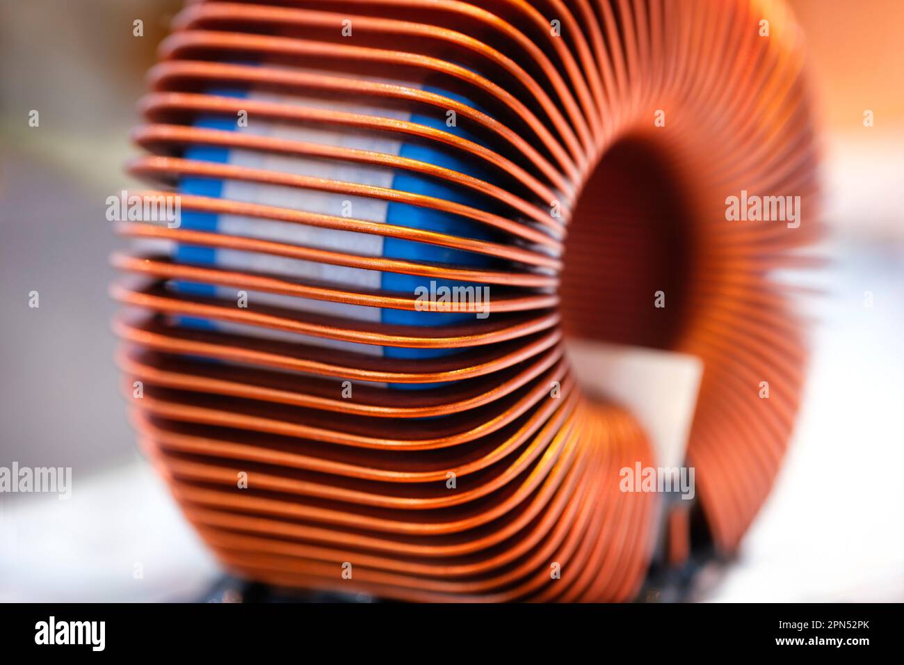 Close-up of toroidal and cylindrical coil, industrial concept ...