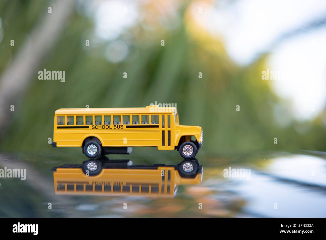 Model of classical american yellow school bus for transporting of kids ...