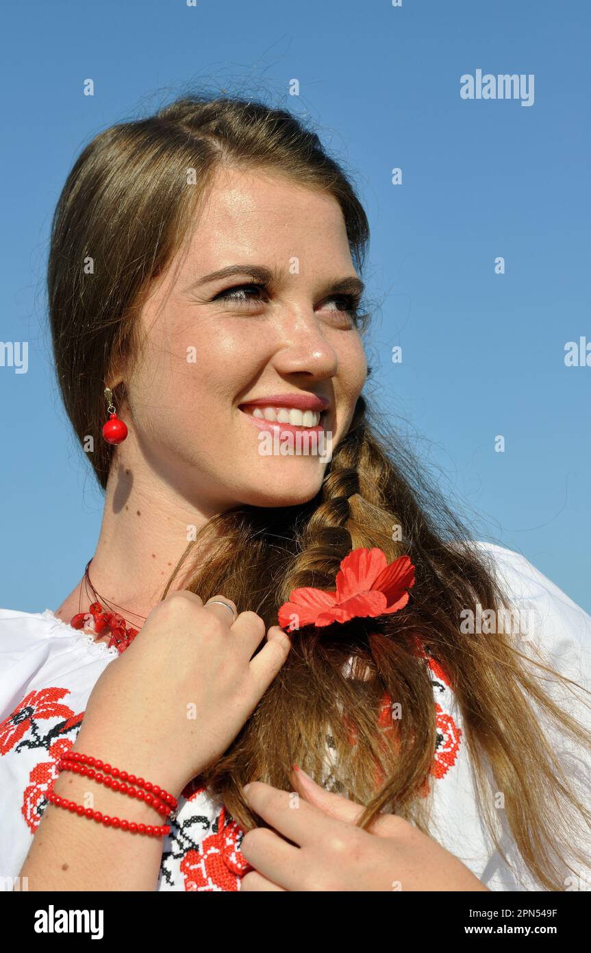 outdoor portrait of  young ukrainian woman in traditional ukrainian clothes Stock Photo