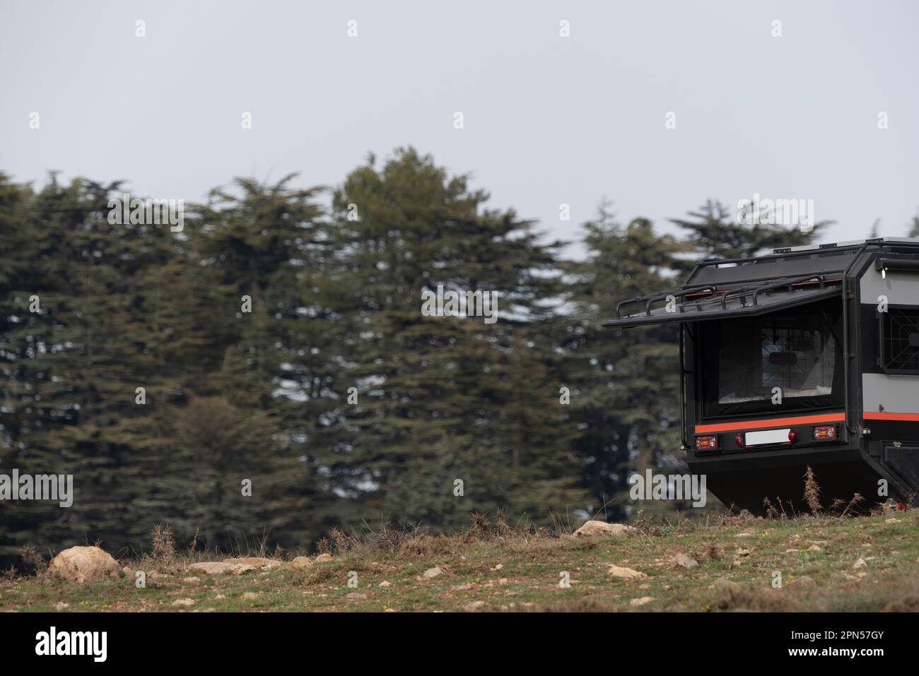 a caravan on the edge of the forest in Antalya Stock Photo