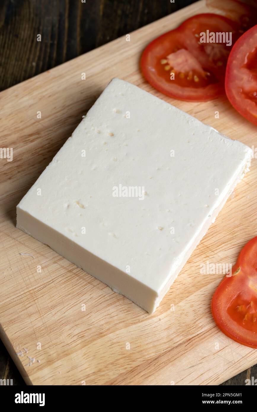 White soft cheese is used in salads, soft white cheese made from cow's
