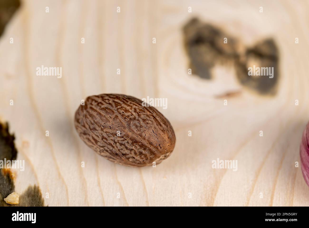 Nutmeg on the table for cooking different types of meat and other