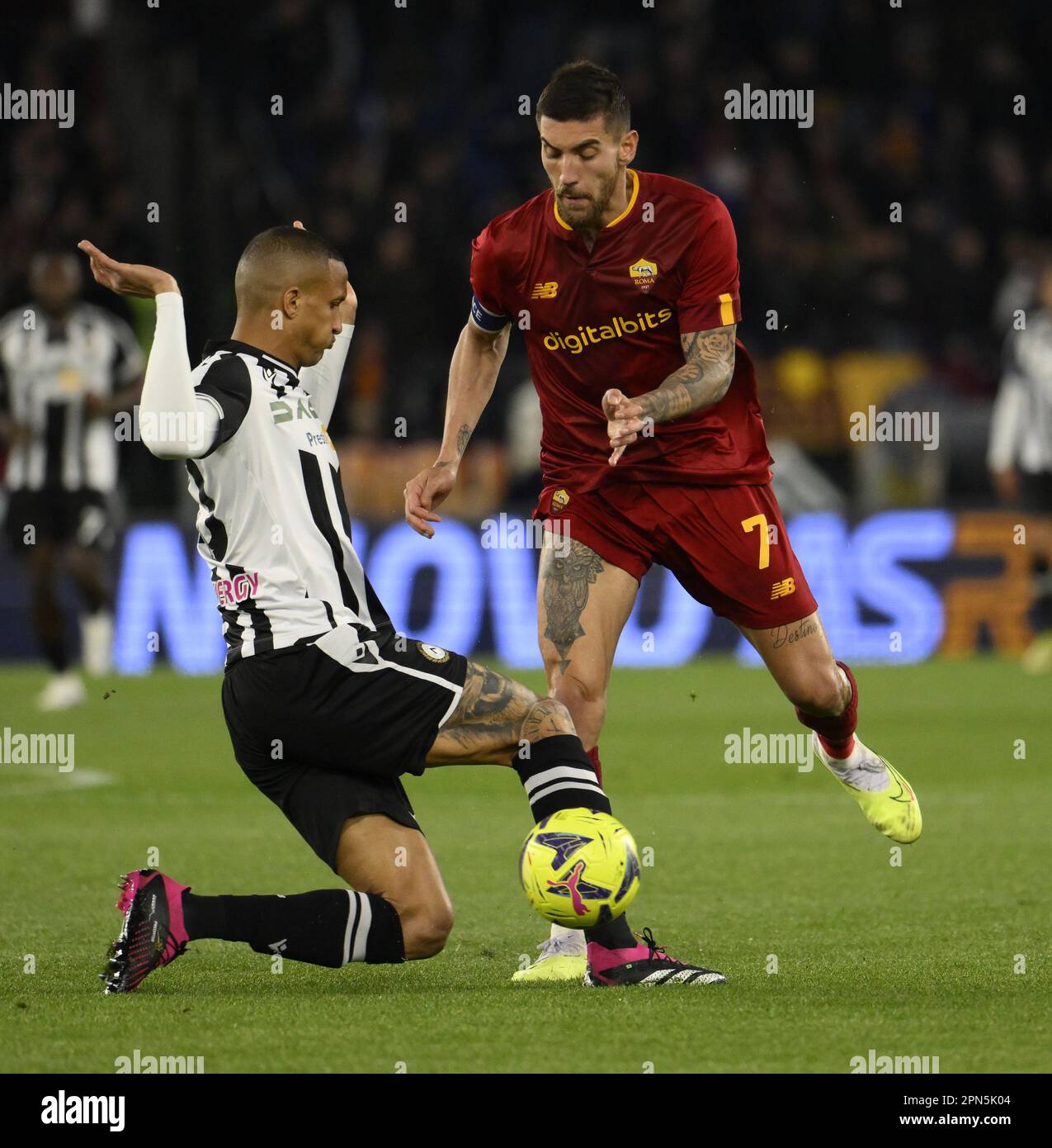 Rome, Italy. 16th Apr, 2023. Roma's Lorenzo Pellegrini (R) vies with Udinese's Rodrigo Becao during a Serie A football match between Roma and Udinese in Rome, Italy, on April 16, 2023. Credit: Alberto Lingria/Xinhua/Alamy Live News Stock Photo