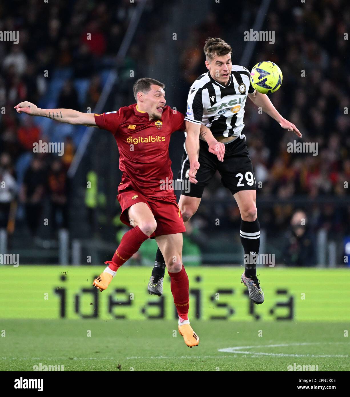 Rome, Italy. 16th Apr, 2023. Roma's Andrea Belotti (L) vies with Udinese's Jaka Bijol during a Serie A football match between Roma and Udinese in Rome, Italy, on April 16, 2023. Credit: Alberto Lingria/Xinhua/Alamy Live News Stock Photo