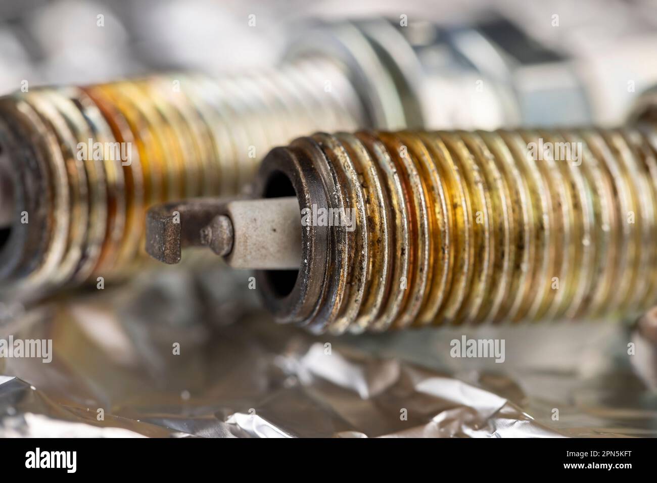 old very damaged car spark plugs, closeup of old used car spark plugs