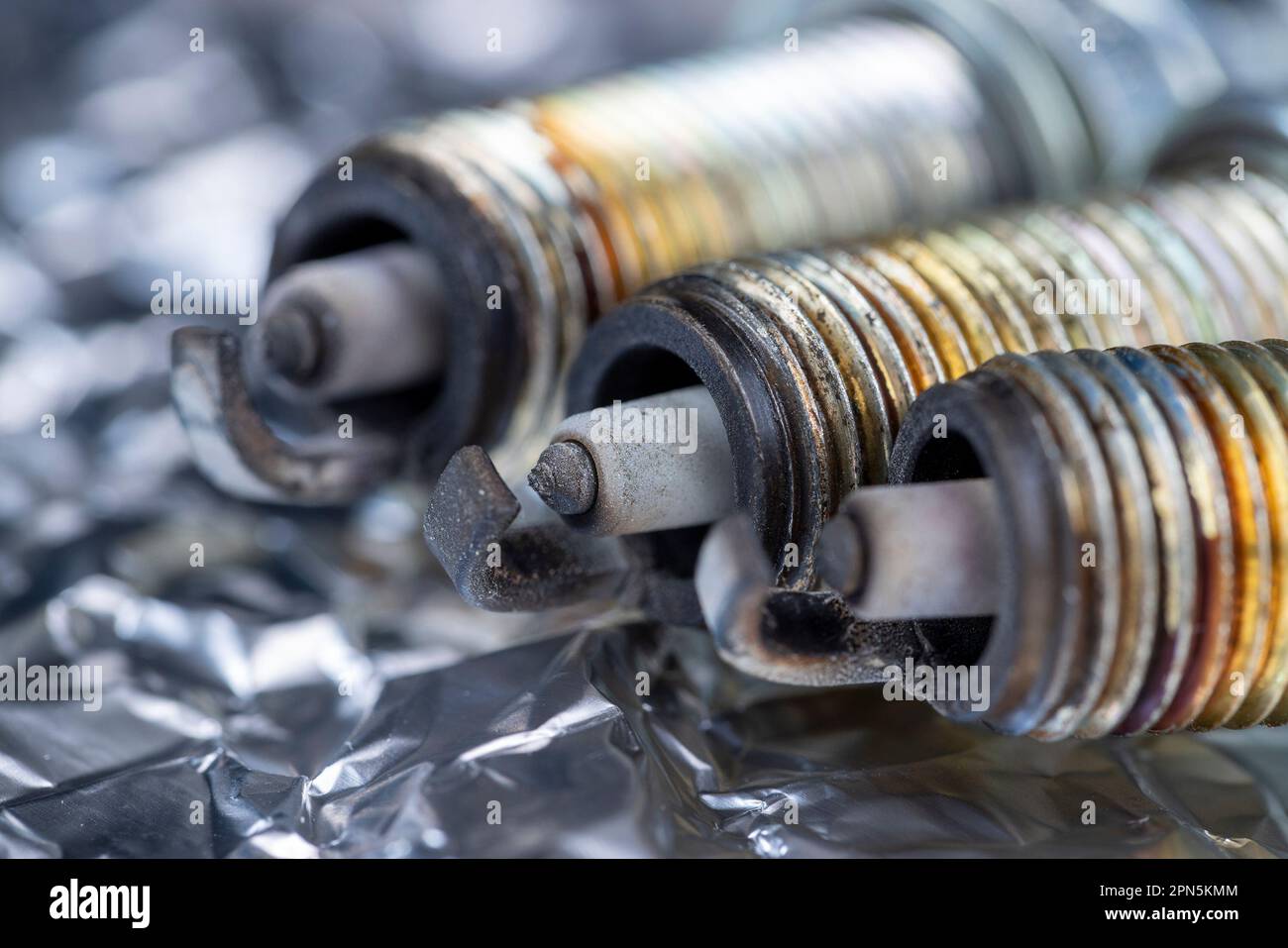 old very damaged car spark plugs, closeup of old used car spark plugs